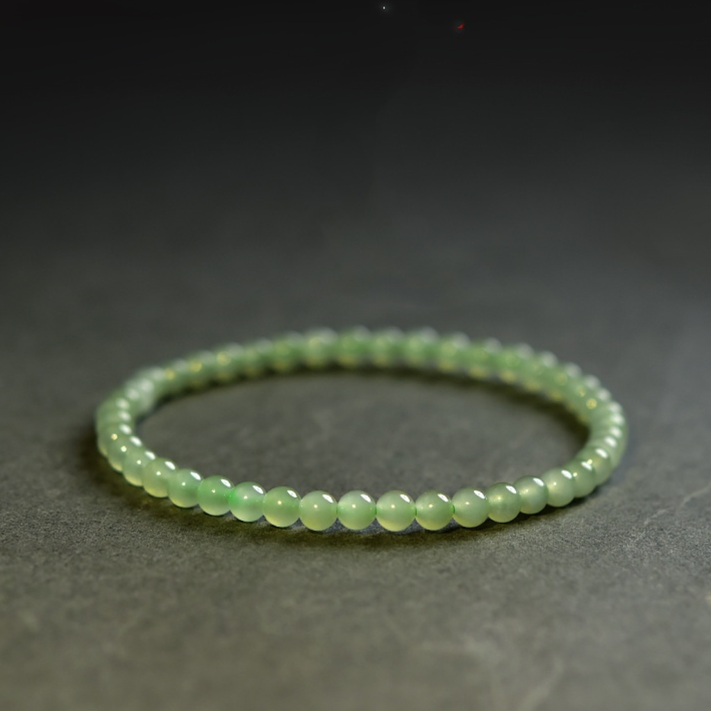 Natural jade bracelet featuring an elegant and fresh design, perfect for adding a touch of sophistication to any outfit.